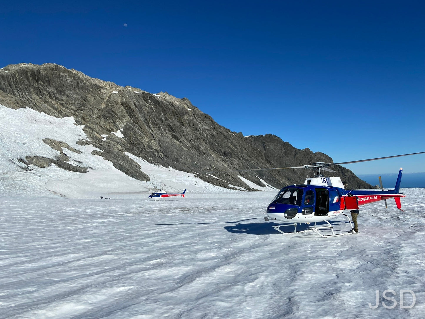 Helicopter on top of glazier
