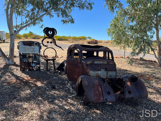 Old car and petrol bowser